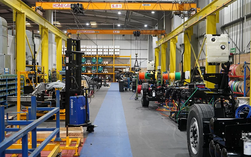 Lorry chassis assembly line with walkway using ecotile