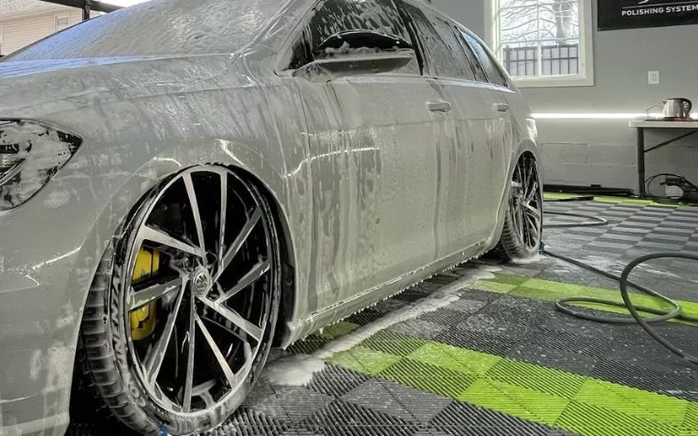 Car Cleaning on Grey & Green Ribtrax Pro Tiles